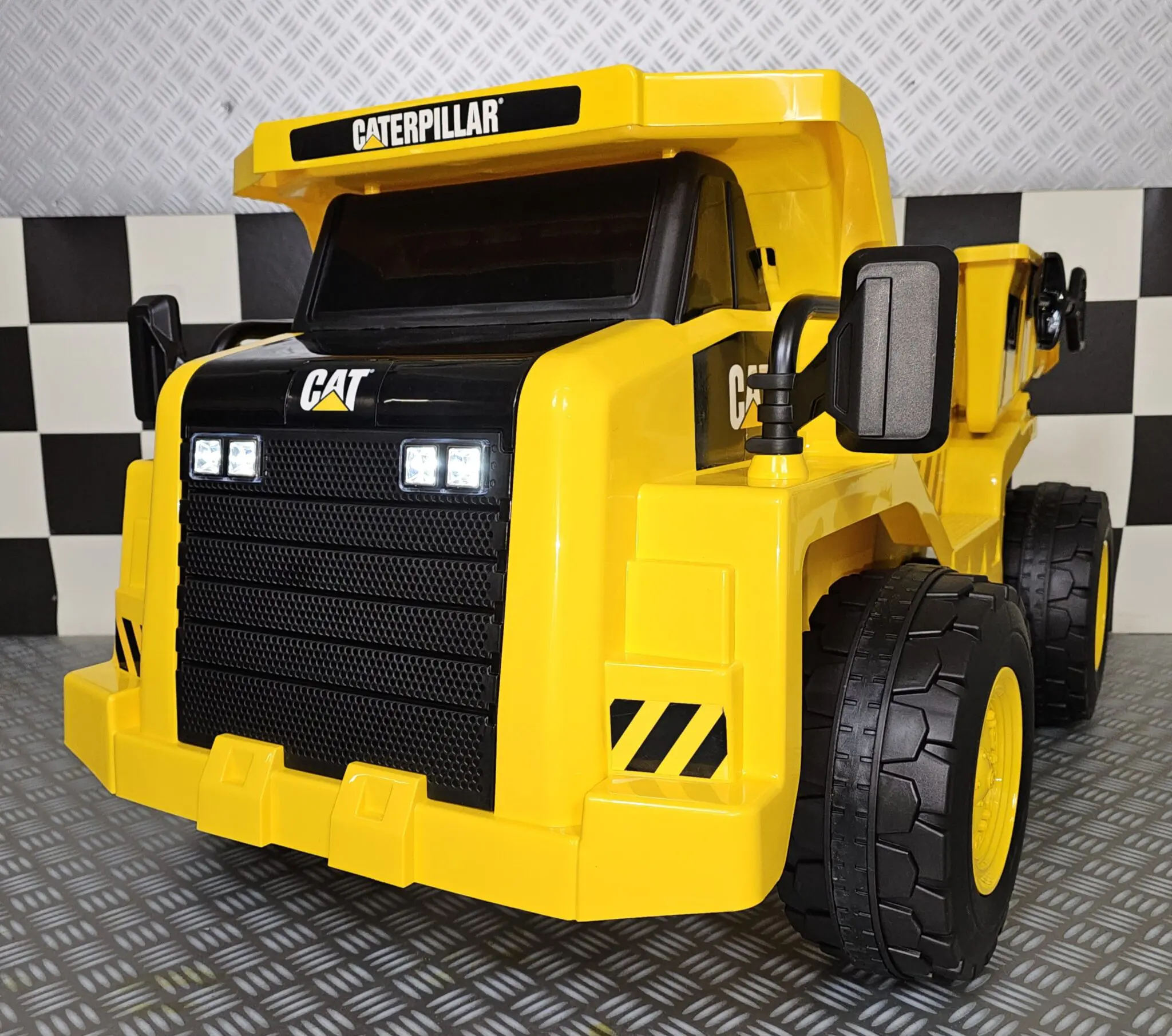 12 volt ride on cat dump truck on sale